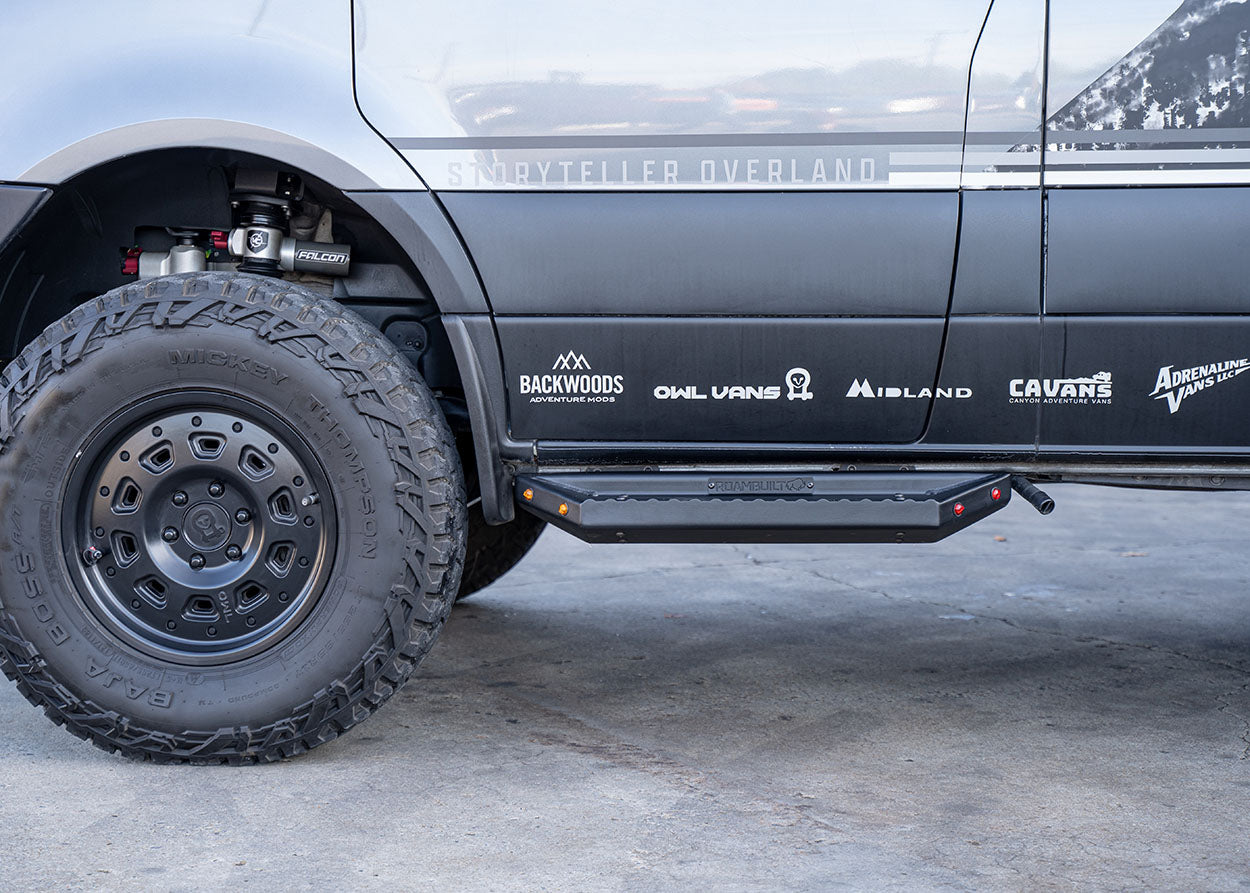 Straight side view of universal ROAMBUILT short side step showing ground clearance and raised grip surface for traction and safety.