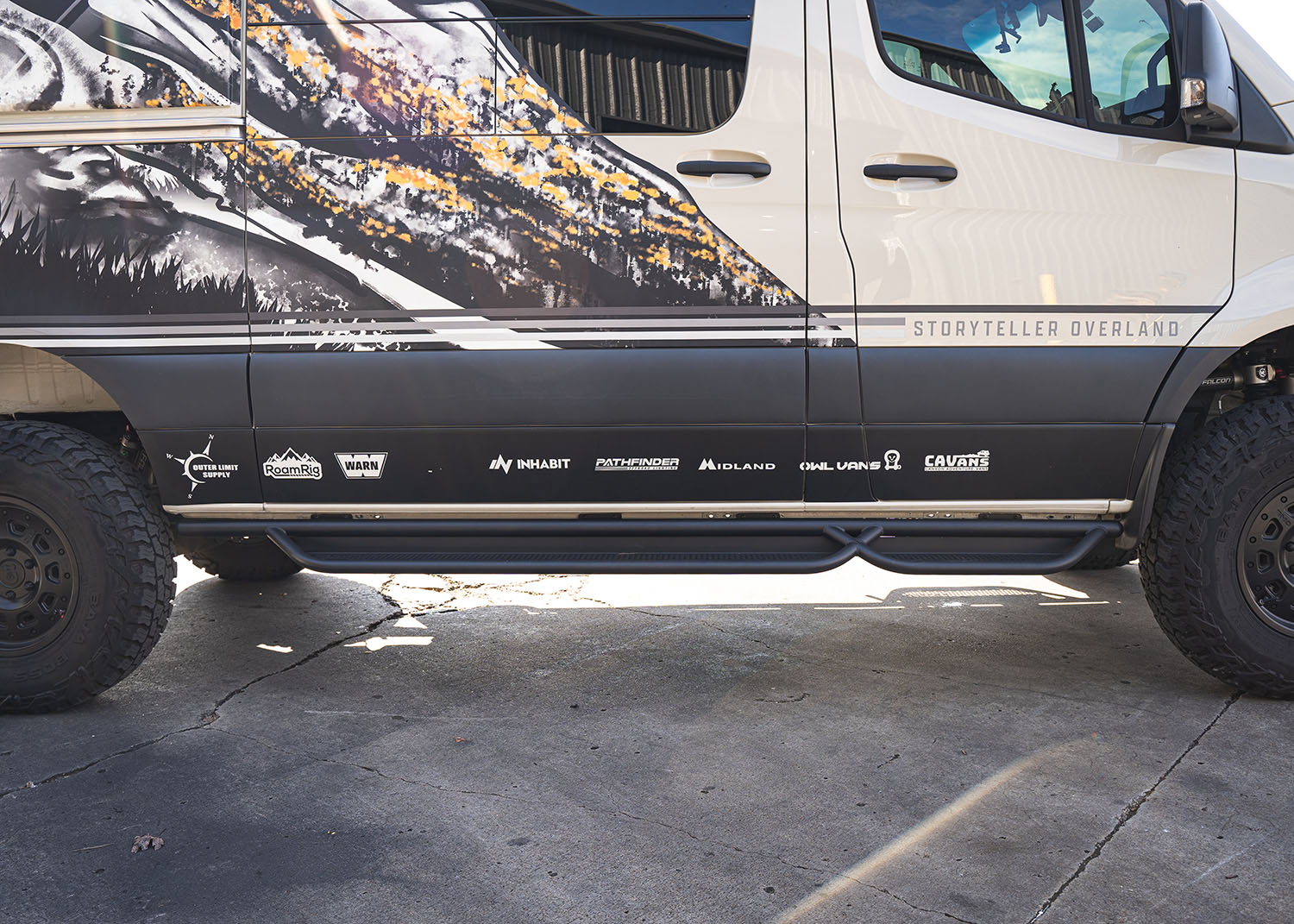 Straight side profile of ROAMBUILT Passenger Side Tube Step on Mercedes Sprinter, showing full tubular design and ground clearance.