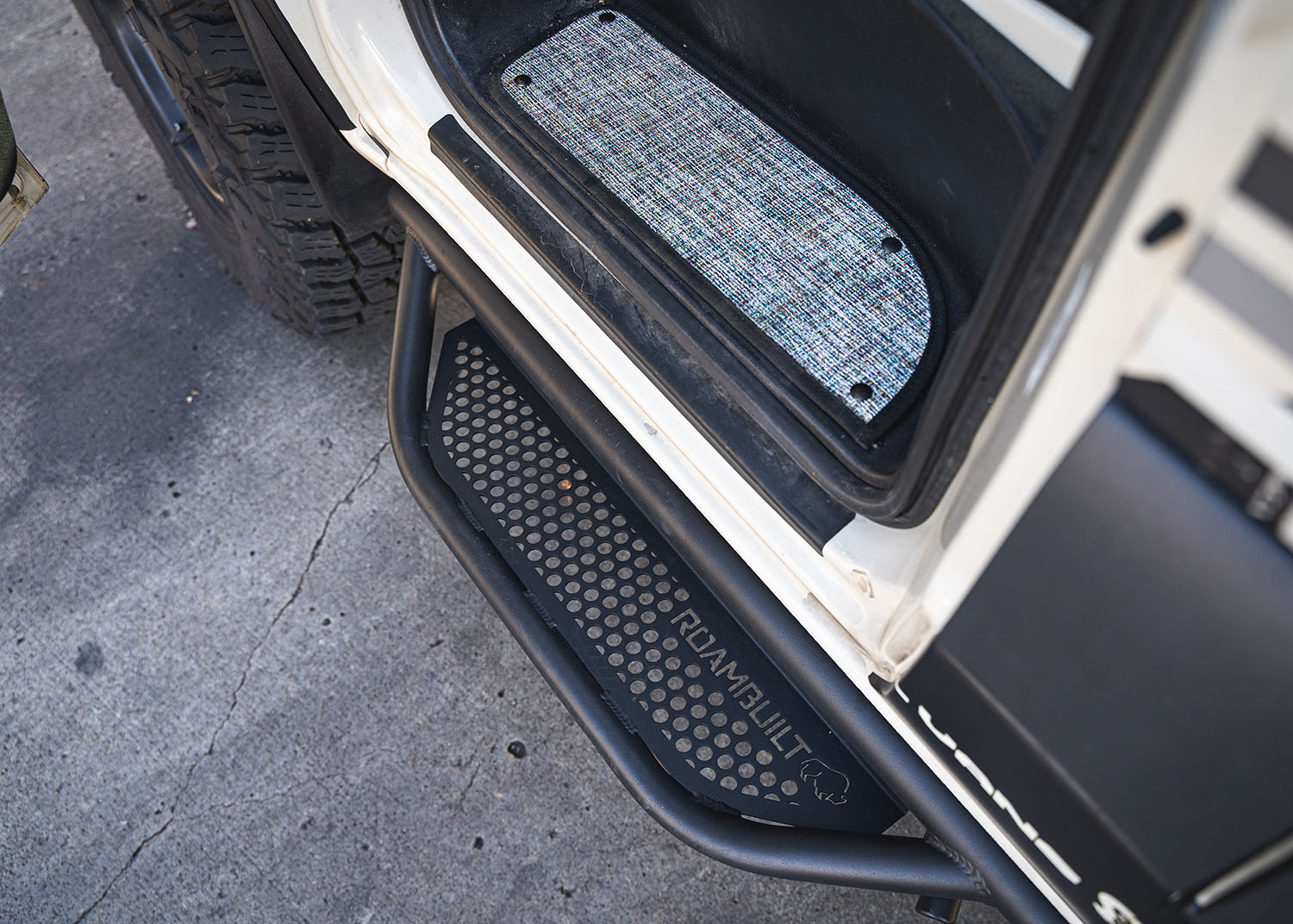 Top-down view of the ROAMBUILT Mercedes Sprinter Side Step – Driver Side, showing the full step with perforated aluminum decking, no mounting brackets visible.