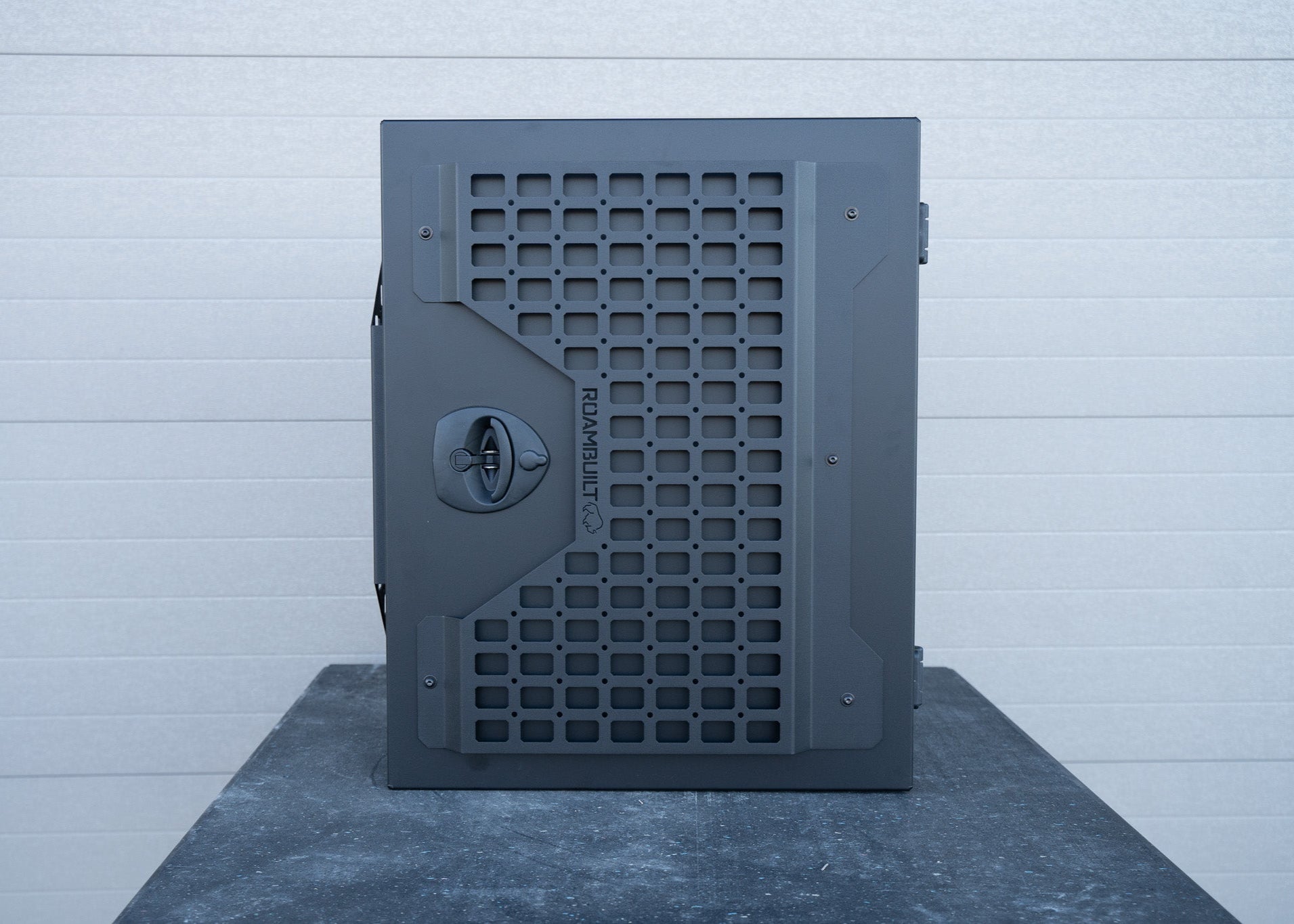 latch, semi-textured powder coat finish, and exterior MOLLE panels on the door.