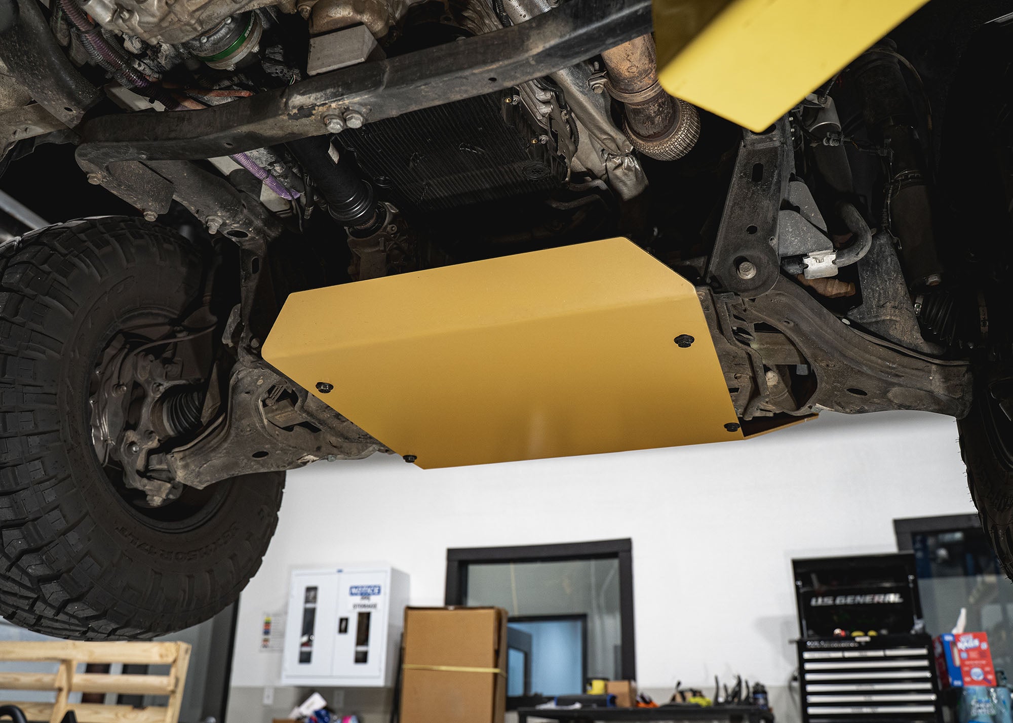 Roambuilt Mercedes Sprinter Skid Plate view from underneath and from the backside