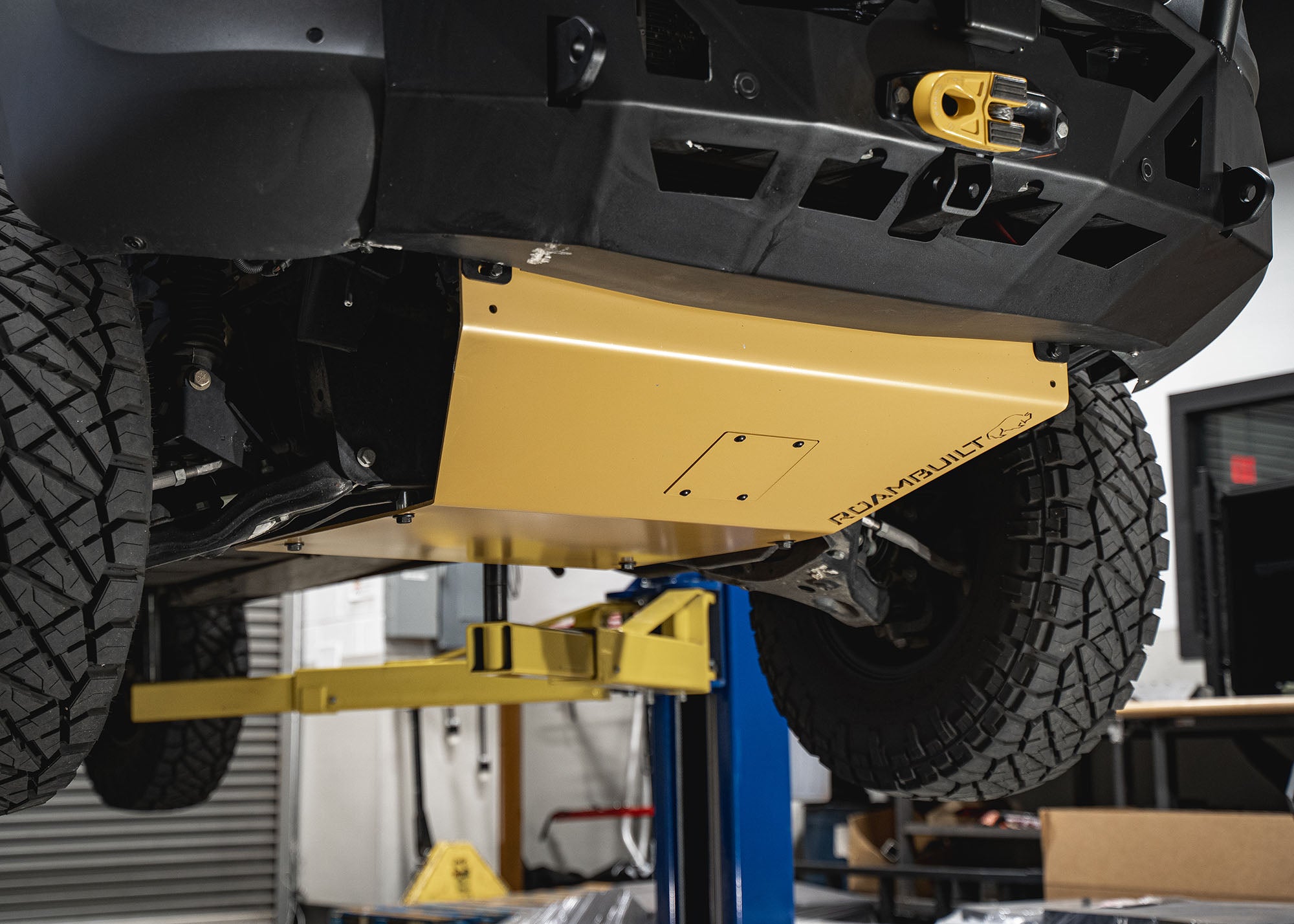Front underside view of the Mercedes Sprinter showing the skid plate and LoPro front bumper installed, highlighting full protection and rugged design.