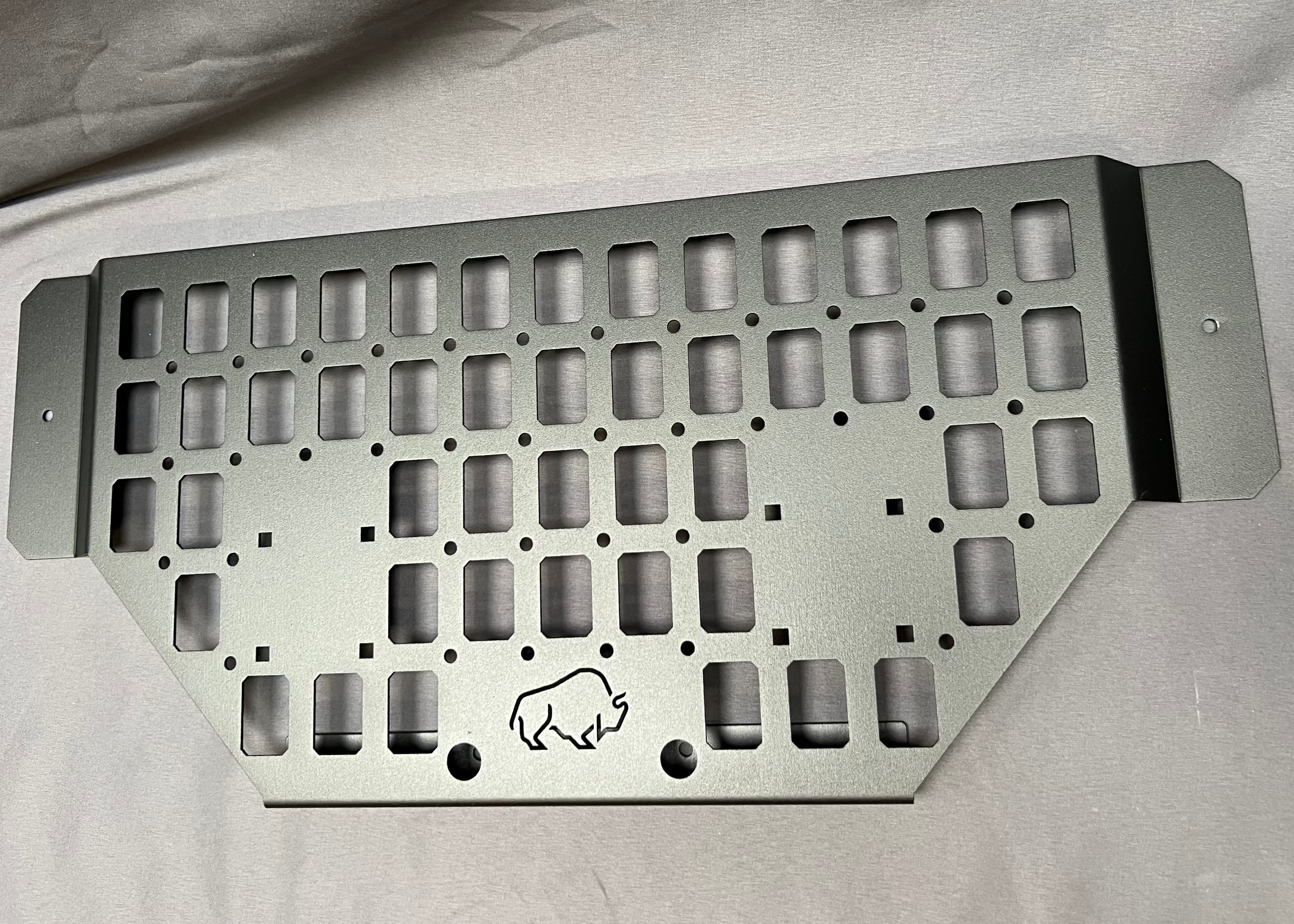 straight view of universal storage box side molle panel
